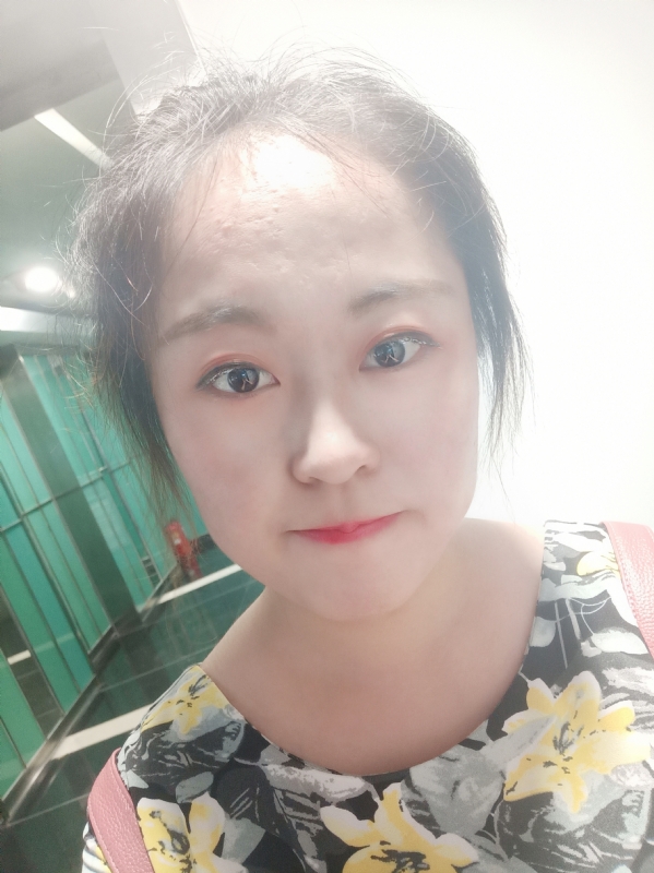 小花伞的第一张照片--大连相亲服务中心