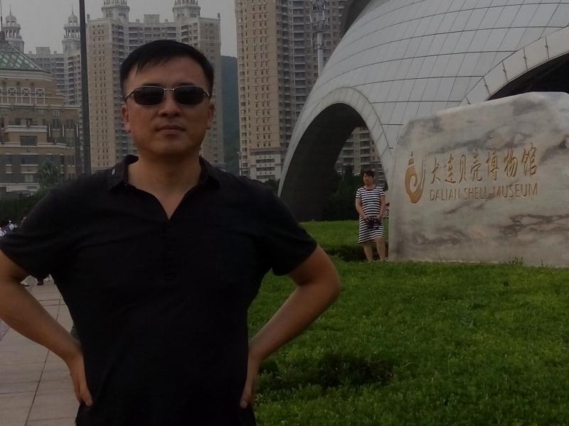 豁达的第一张照片--大连相亲服务中心