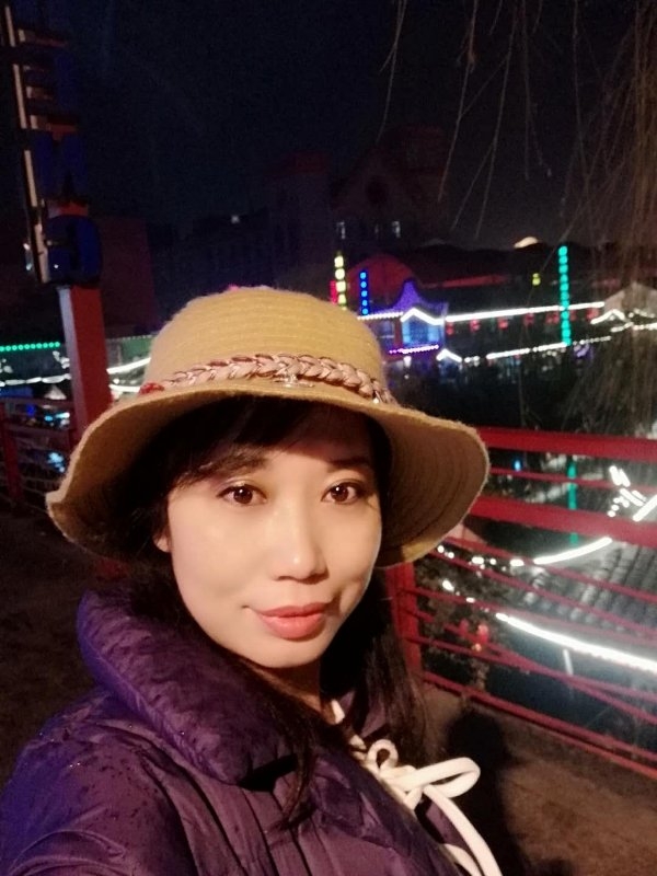 阳光明媚的第一张照片--大连相亲服务中心