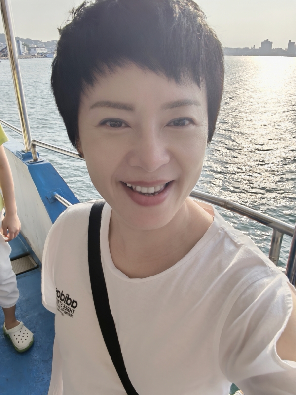 Tina的第一张照片--大连相亲服务中心